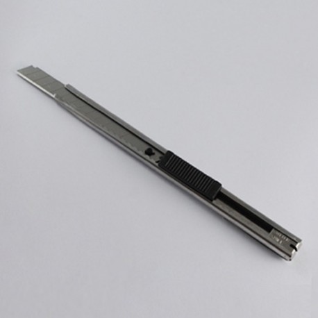 Cutter YG-603 pequeño con cuchillas intercambiables